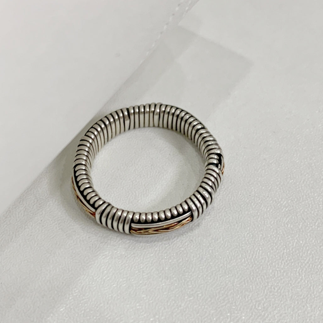 Silver ring with gold filigree accents