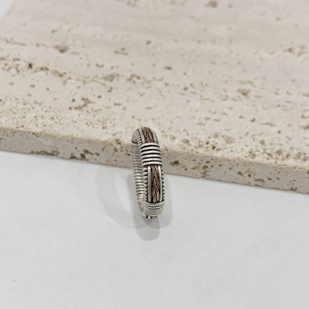 Silver ring with gold filigree accents