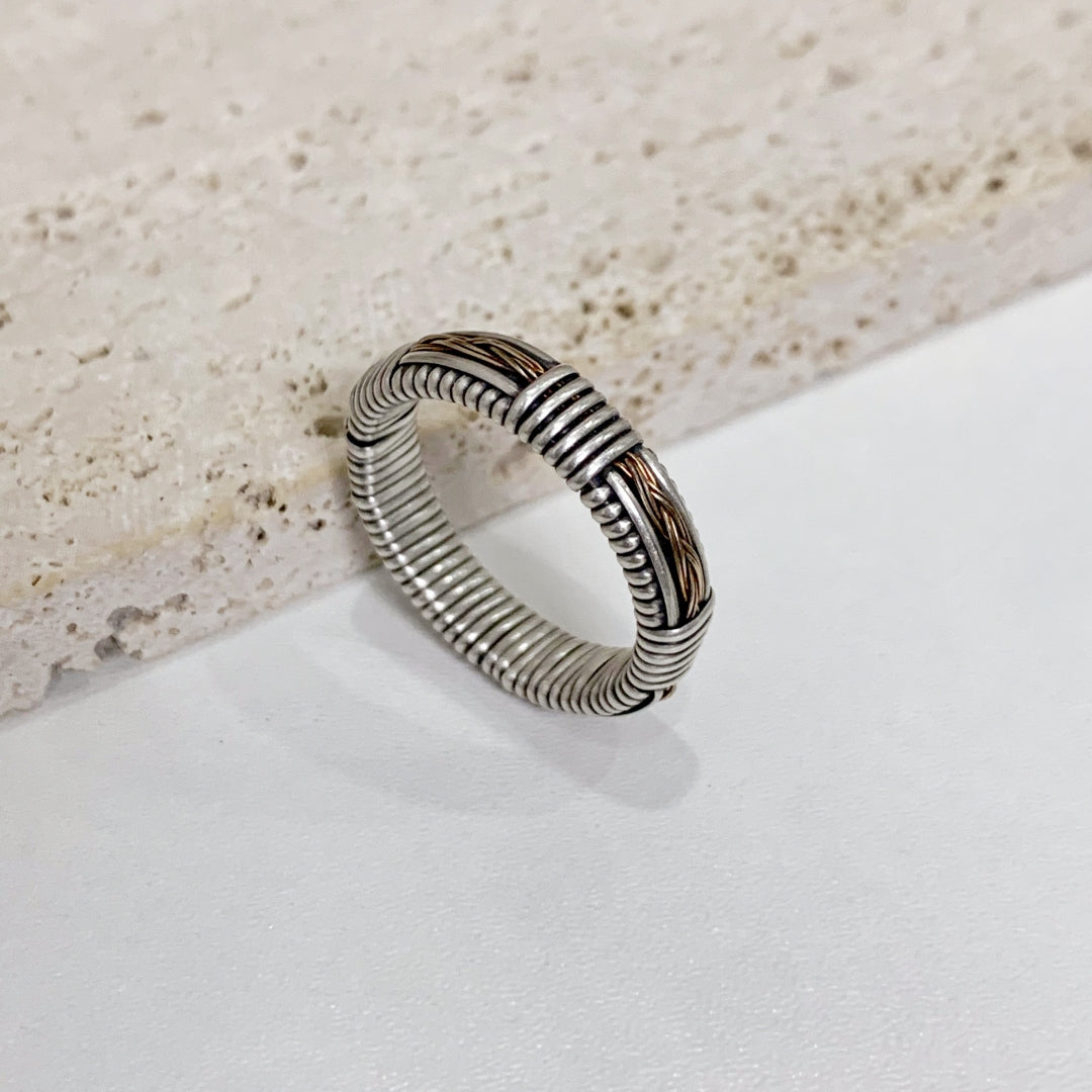 Silver ring with gold filigree accents