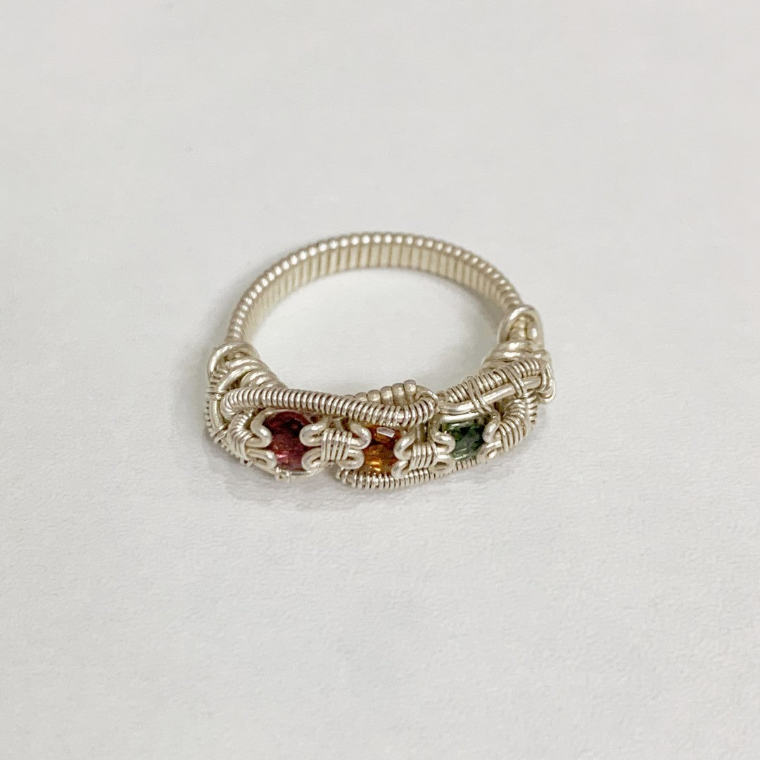 Hand-woven diamond-set wrap ring in sterling silver