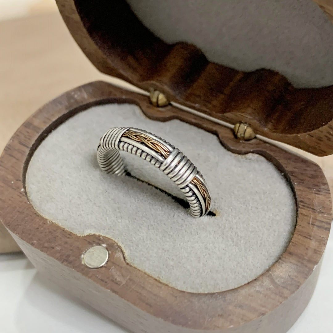 Silver ring with gold filigree accents